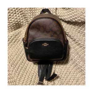 Mini Coach Backpack.